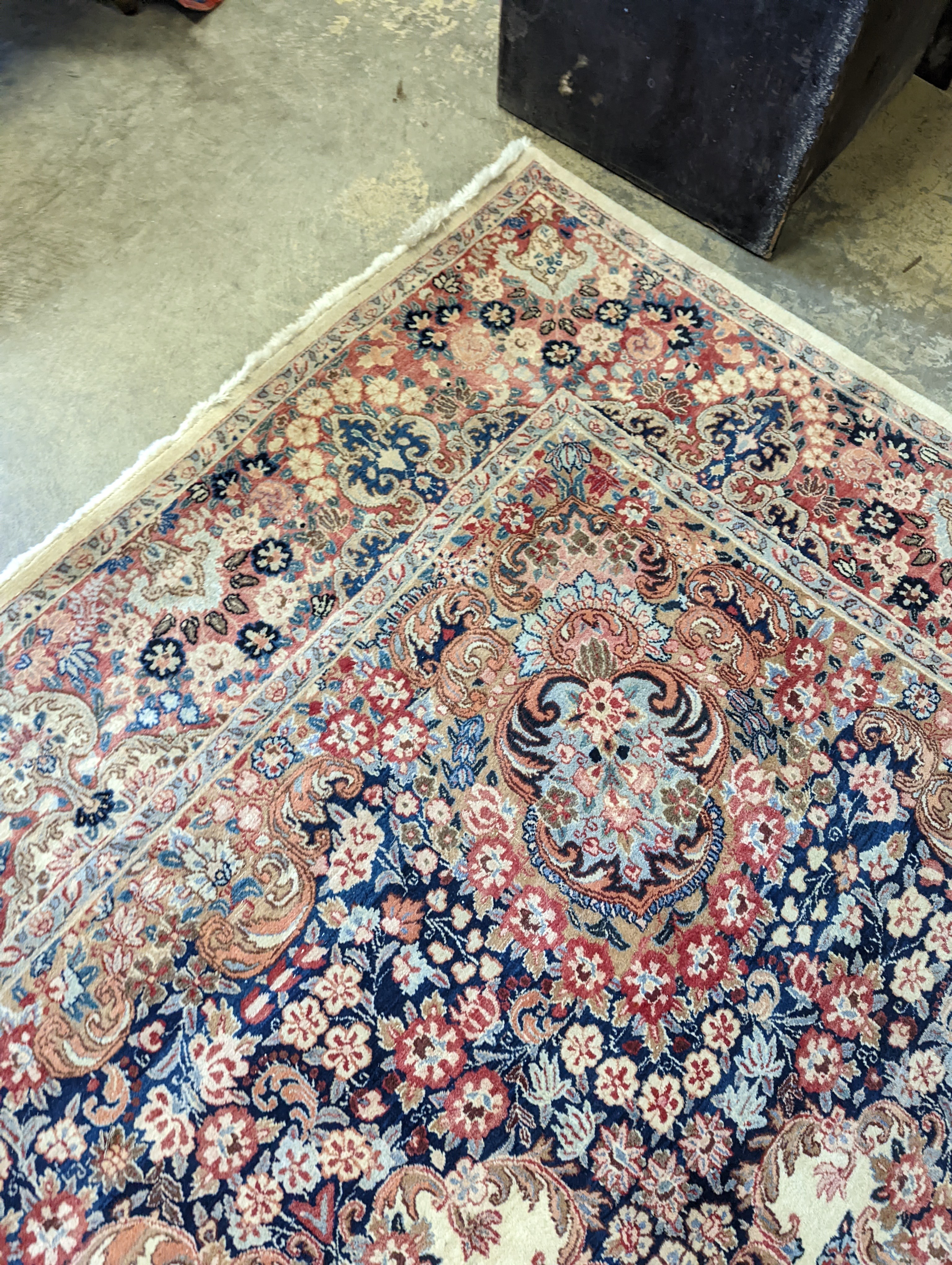 A North West Persian ivory ground carpet, 410 x 310cm